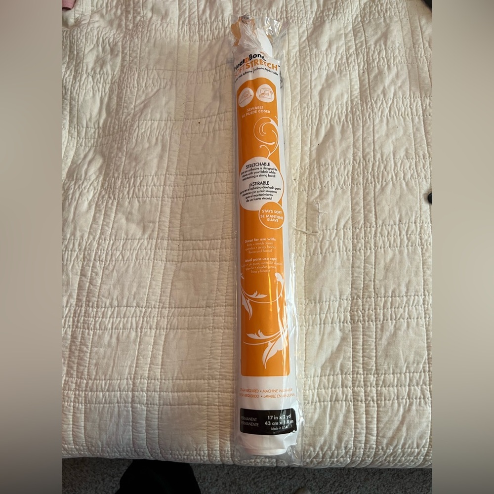 Heat n Bond Soft Stretch. Disable Web Adhesive. Never used. 17” x 2 yards.